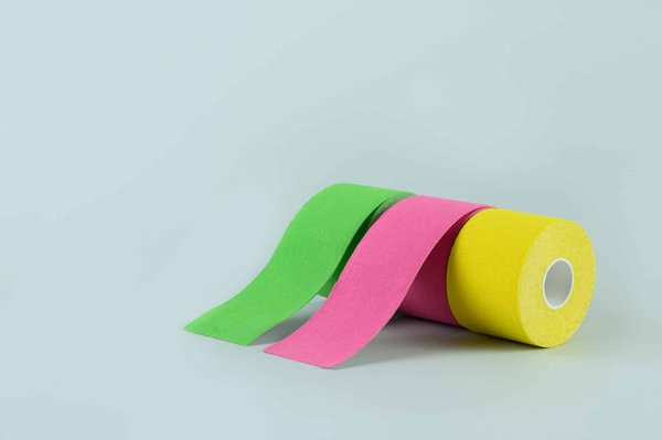 Exploring the Impact of Kinesiology Tape on Squat Muscle Performance: A Deep Dive into Athletic Enhancement